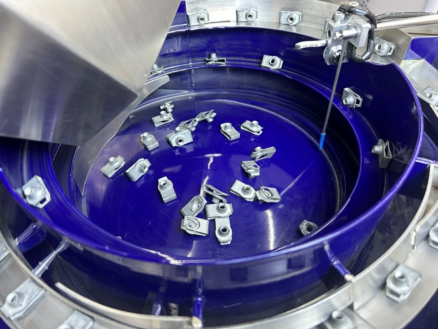 automotive U clips in a vibratory bowl feeder automotive U clips in a vibratory bowl feeder