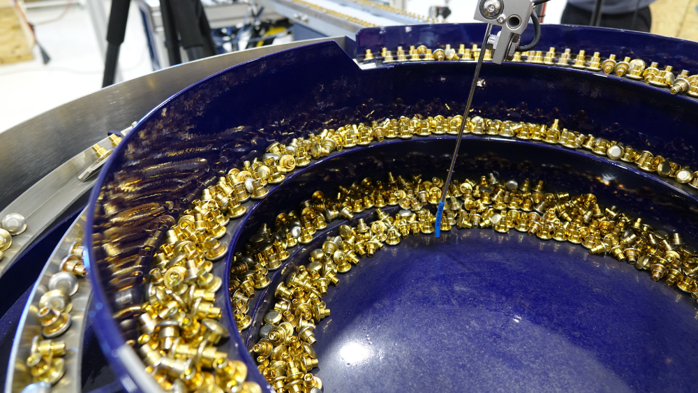 Vibratory bowl feeder for round-headed rivets