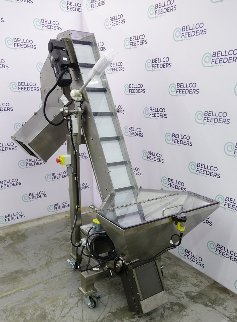 Bellco elevated conveyor hopper on casters, with a stainless bulk bin and an inclined cleated belt