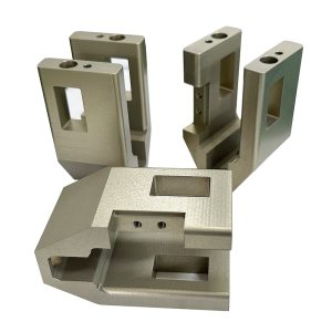 Machined aluminum brackets and housings with an anodized finish