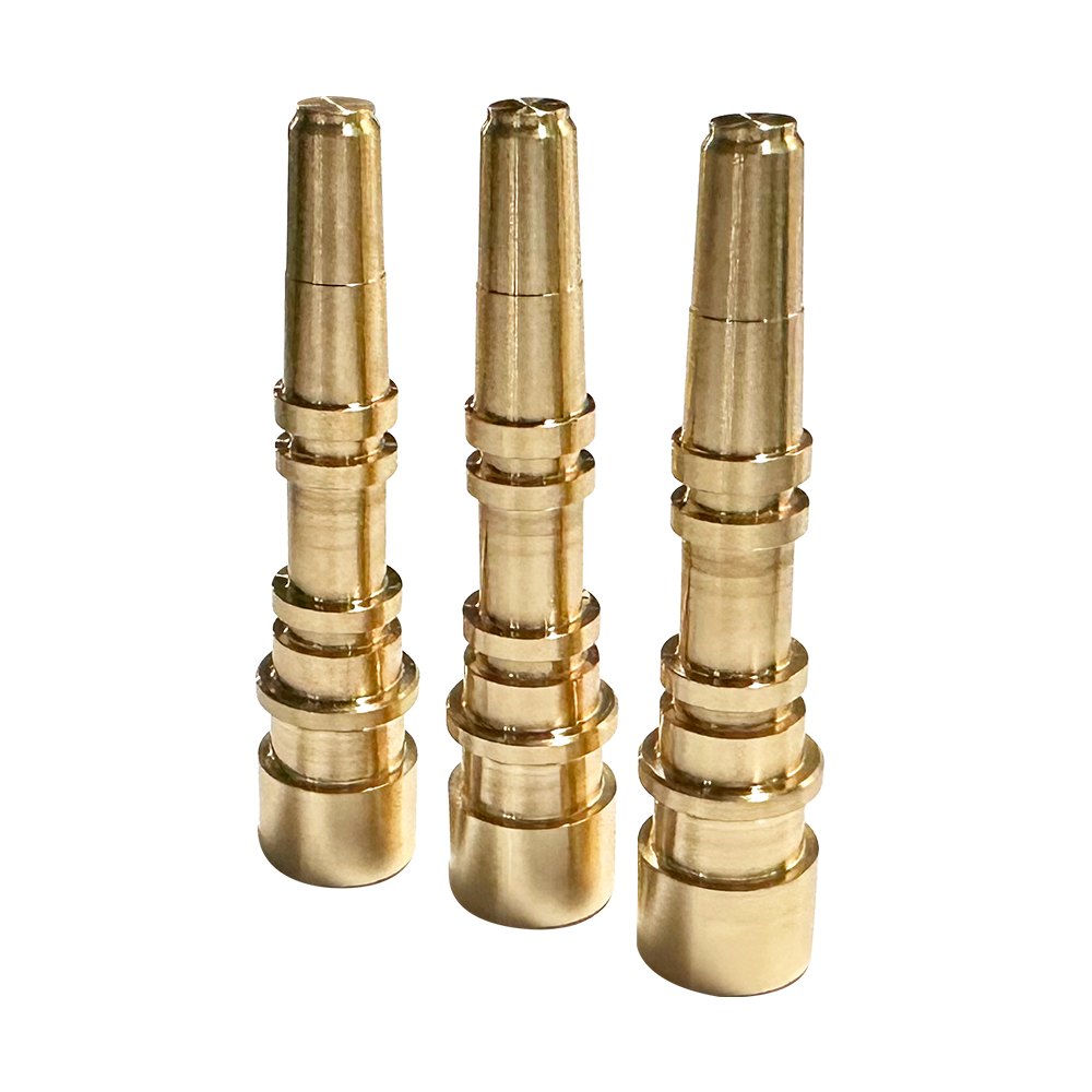 Turned brass nozzle bodies with machined thread and hex detail