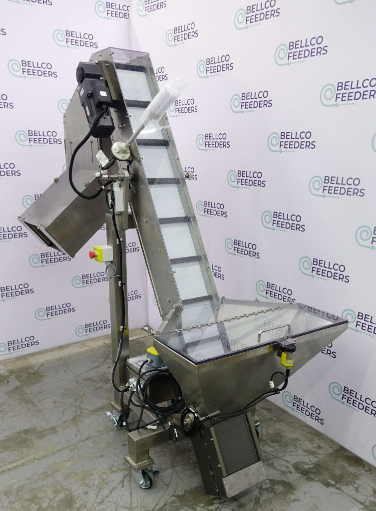 elevated conveyor hopper featuring a cleated belt and stainless steel hopper