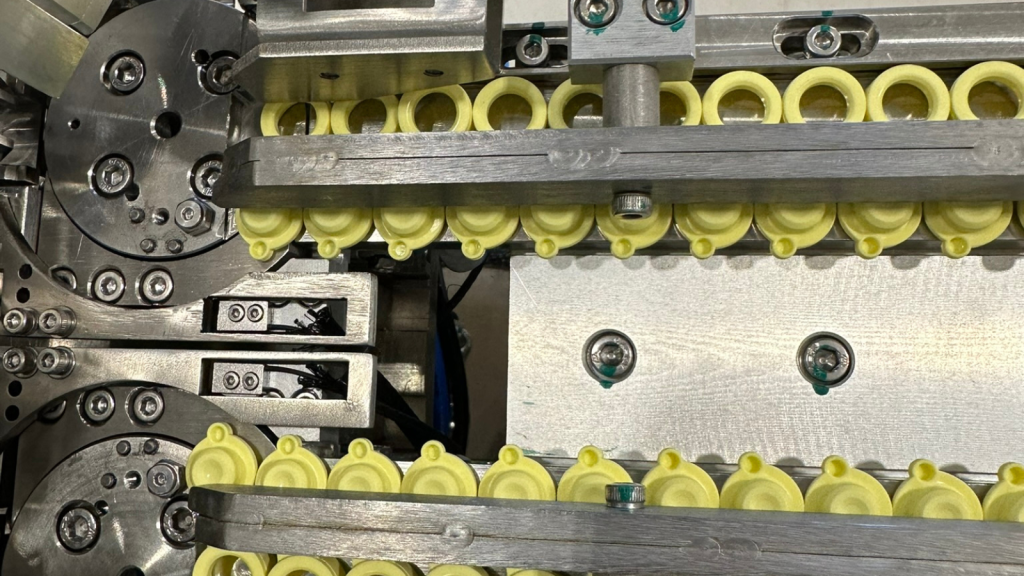 Custom design keeps lids from falling into the rotary dial
