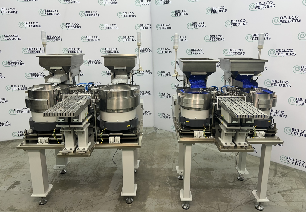 Two completed bowl feeder systems