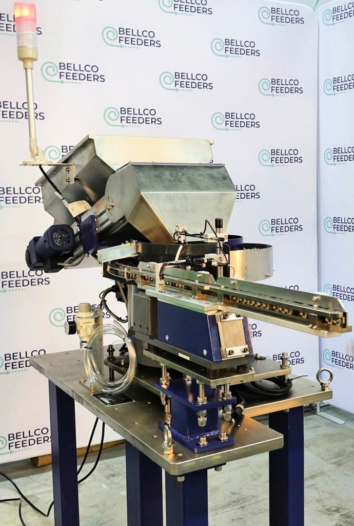 front view of the entire feeding system including bulk hopper, bowl feeder and linear track