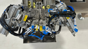 Rotary to pick-and-place escapement
