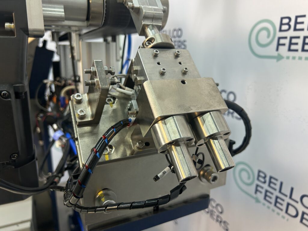 Close-up of a pneumatic escapement with twin air cylinders