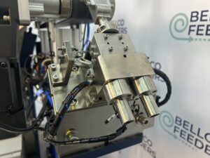Close-up of a pneumatic escapement with twin air cylinders